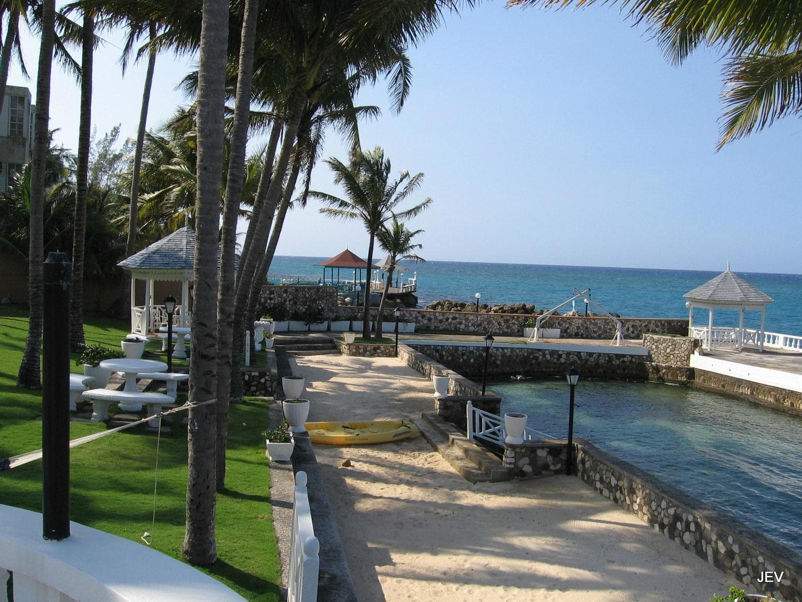 Sand bar beach by ocean pool