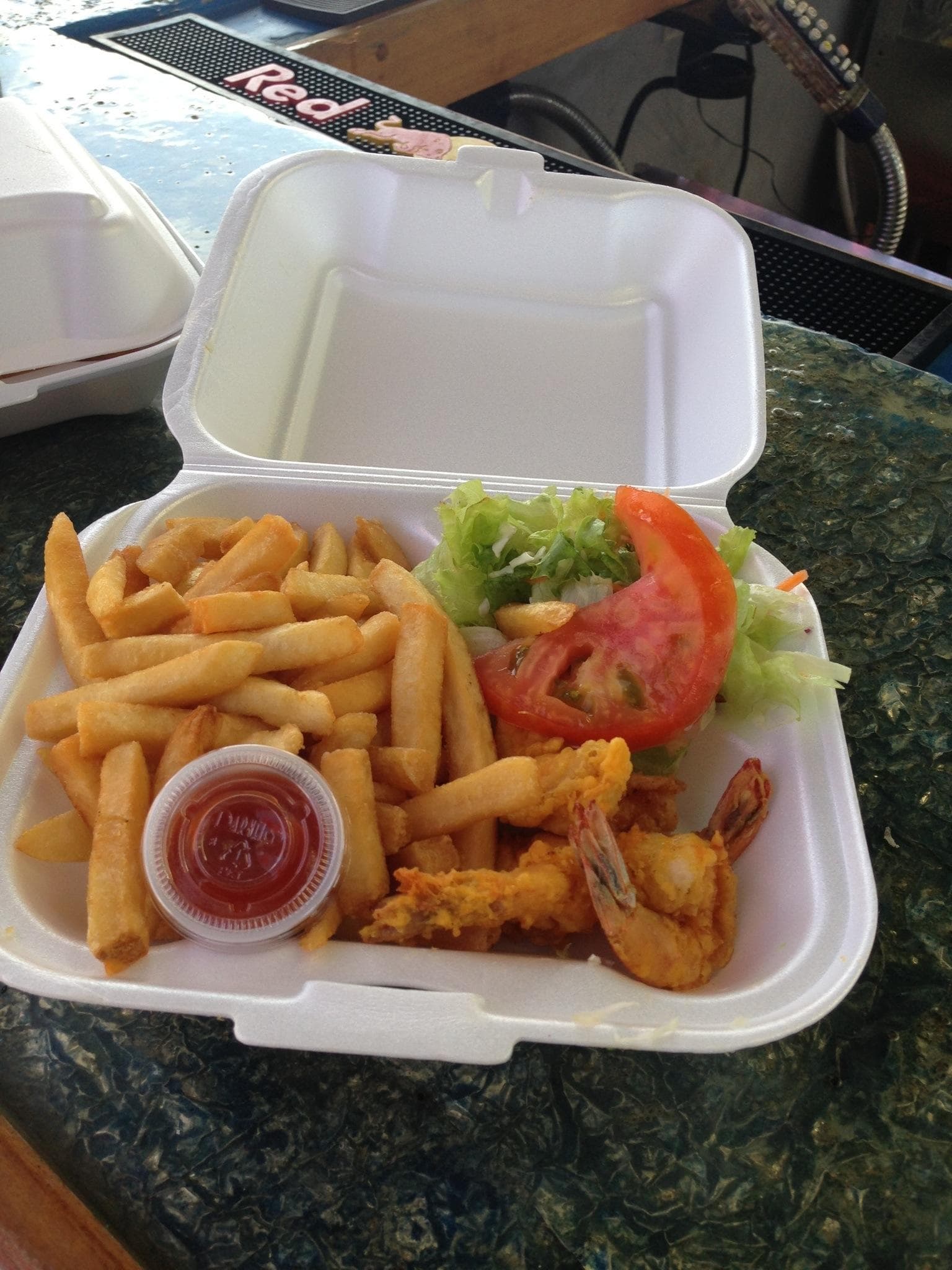 Delicious coconut shrimp and french fries at the famous restaurant PIER 1 in Montego Bay.