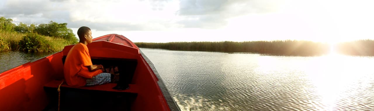 Heading up Black River at dusk