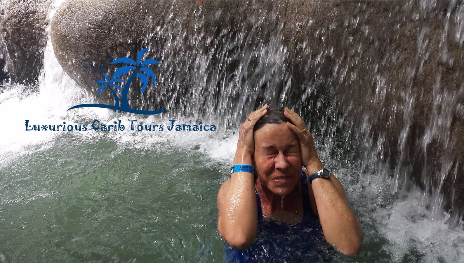 Nancy emerging from the washing machine at Mayfield Falls Jamaica with Luxurious Carib Tours