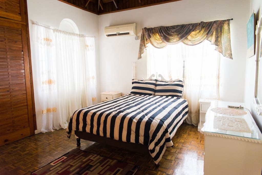 Room Equipped with Ceiling Fan, Full size Bed, Air Condition, TV and cable