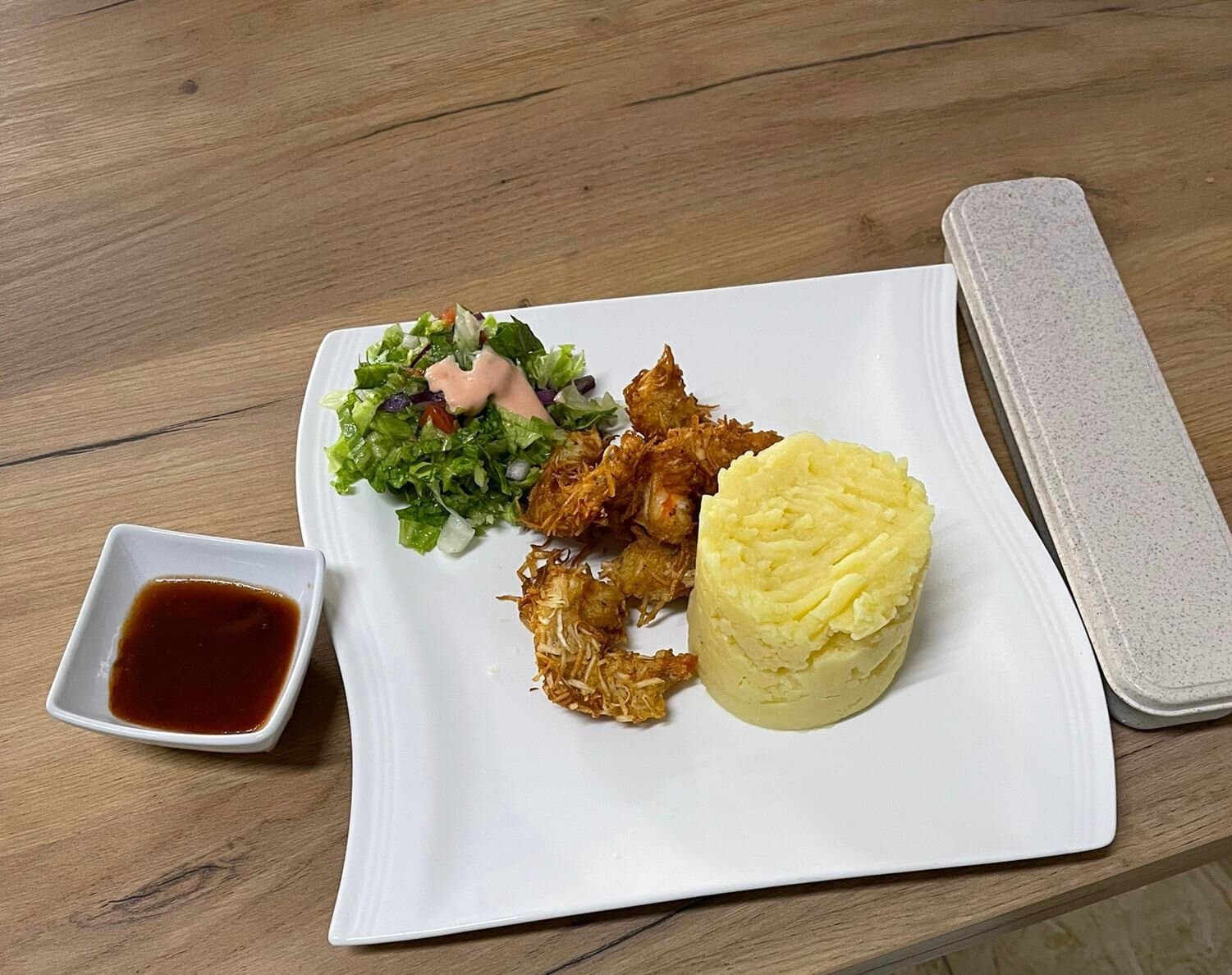 Creamy mash potato with coconut crusted shrimp and garden salad