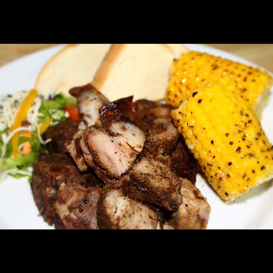 Jerk Pork With Roast Corn and Hardough Bread