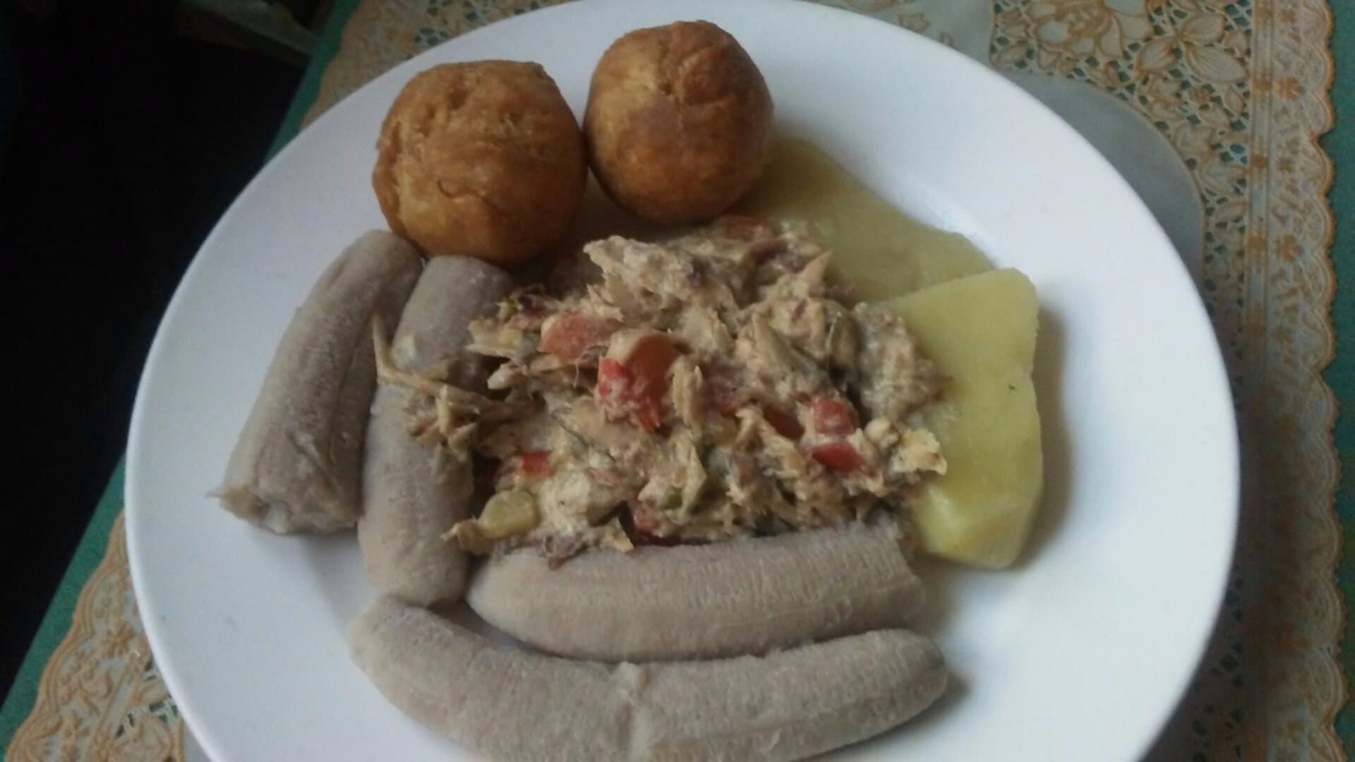 Mackerel Rundown, boiled green bananas, yellow yams and fried dumplings