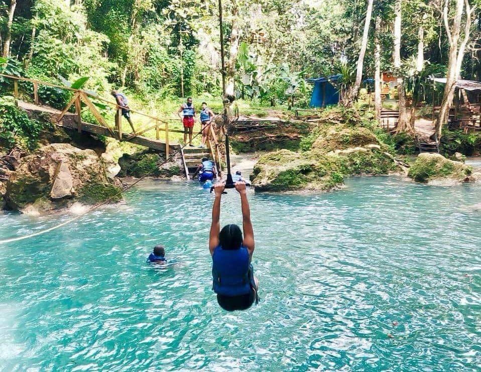 Rope Swinging at the Irie Blue Hole