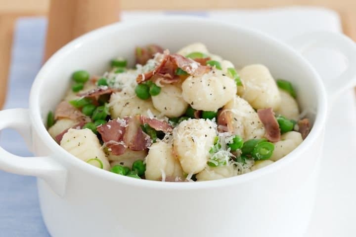 GNOCCHI PRIMAVERA: (Italian Potato Dumplings) with Prosciutto, spring peas, string beans & Parme
