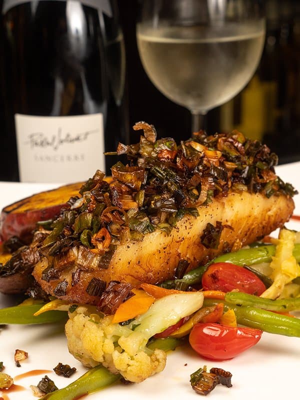 The Karla - spicy escallion and Scotch Bonnet pepper on a pan seared fish fillet