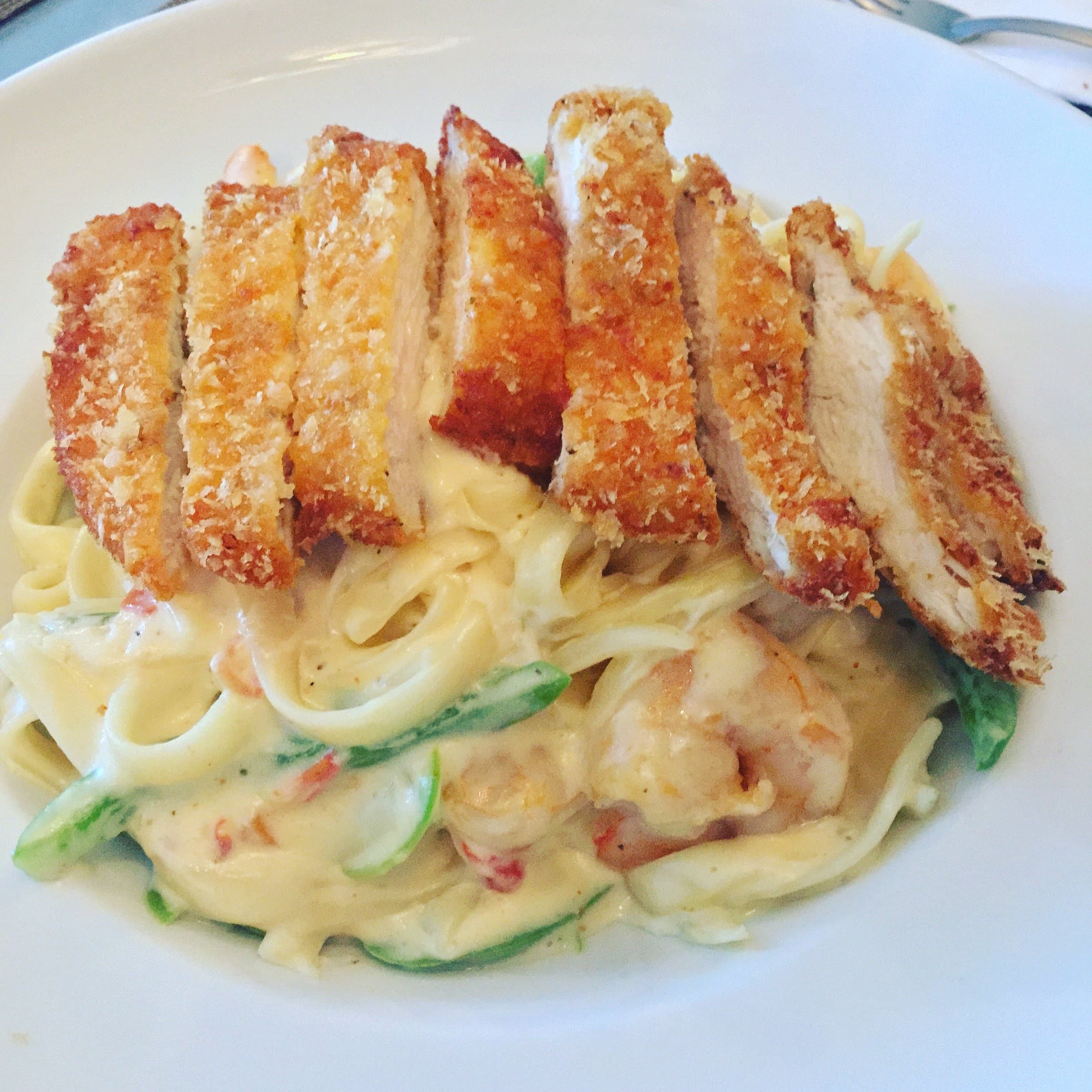 Alfredo Pasta with Grilled Shrimp and Crispy Fried Chicken