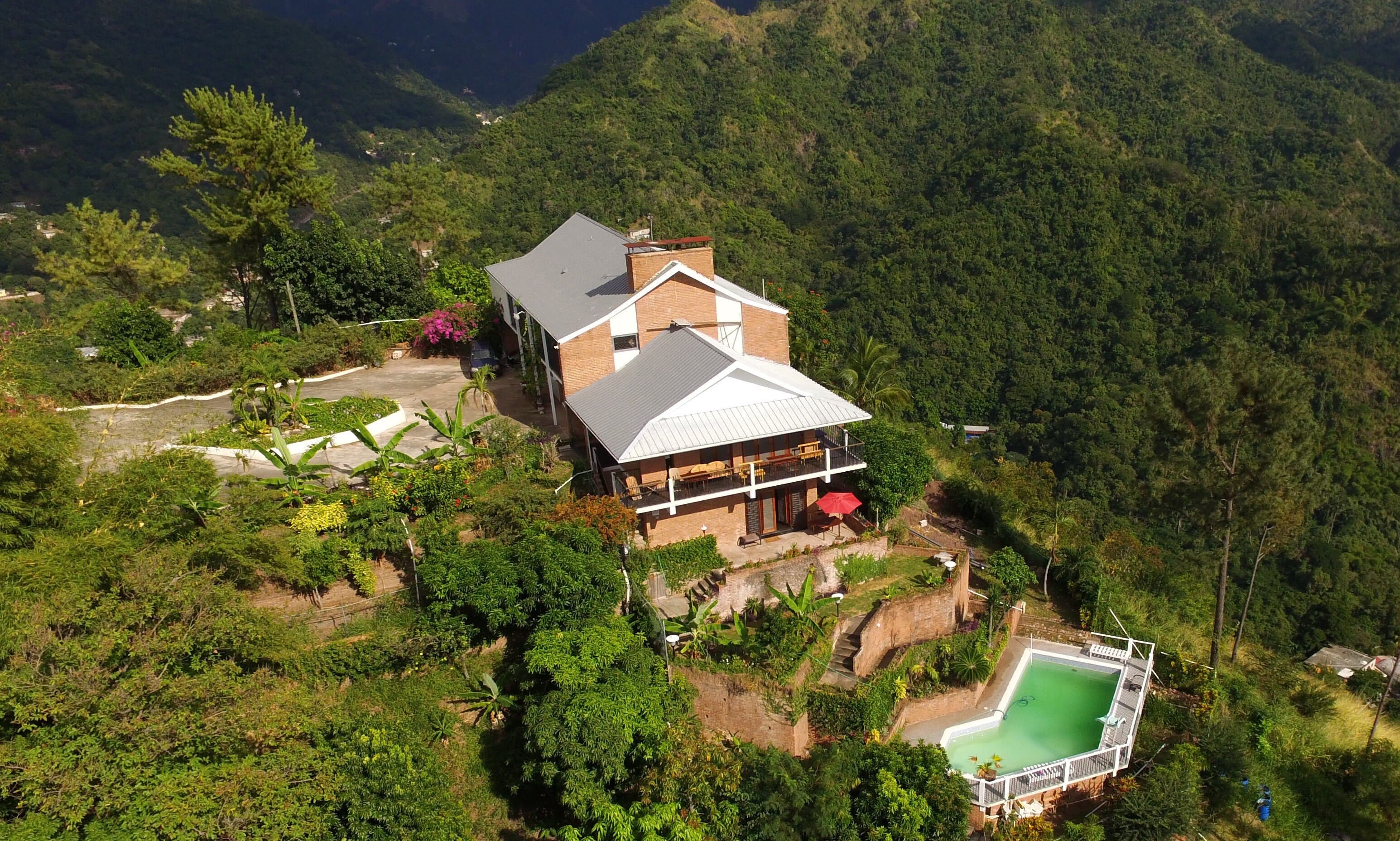 Tranquility Estate nestled in the foot of the Blue Mountains, however just a 20 minute drive to the centre of Kingston. With stunning views, the cool of the hills a vista to delight, we offer you the best of Kingston.
