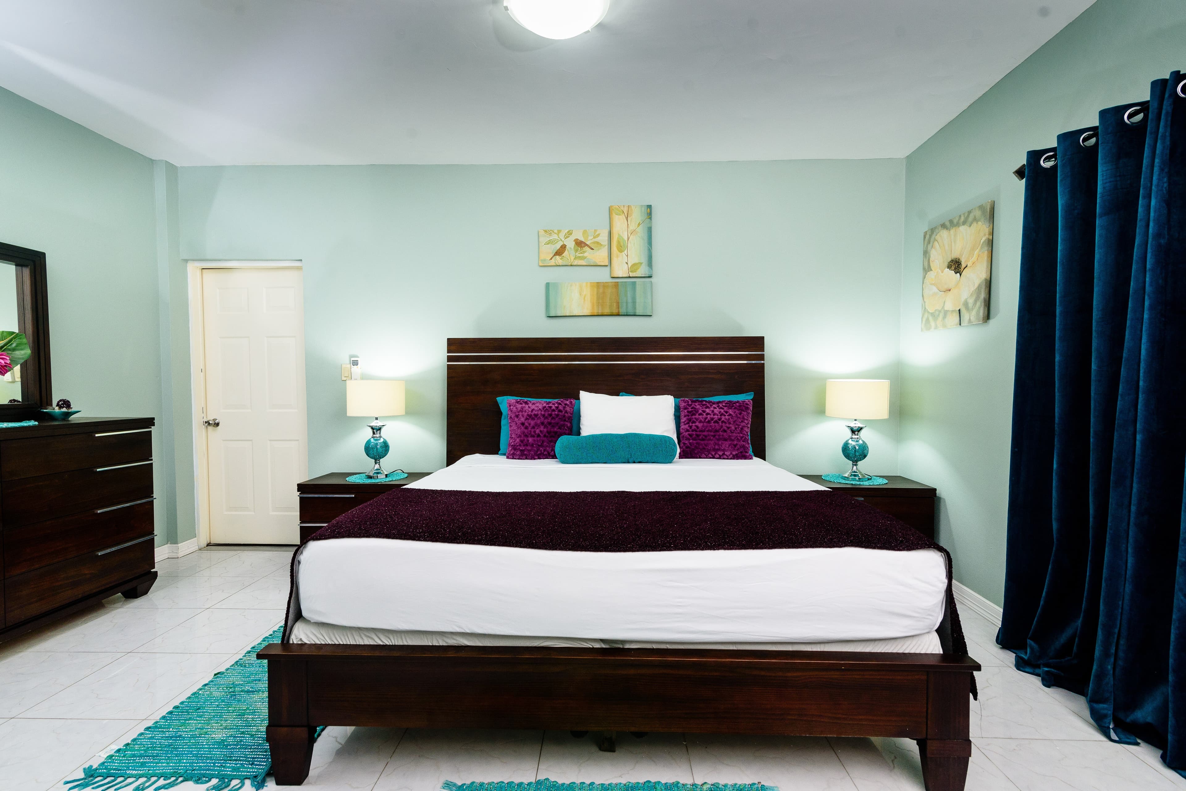 TWO BEDROOM VILLA-this room offers a king sized bed with an ensuite bathroom, A/C and TV.