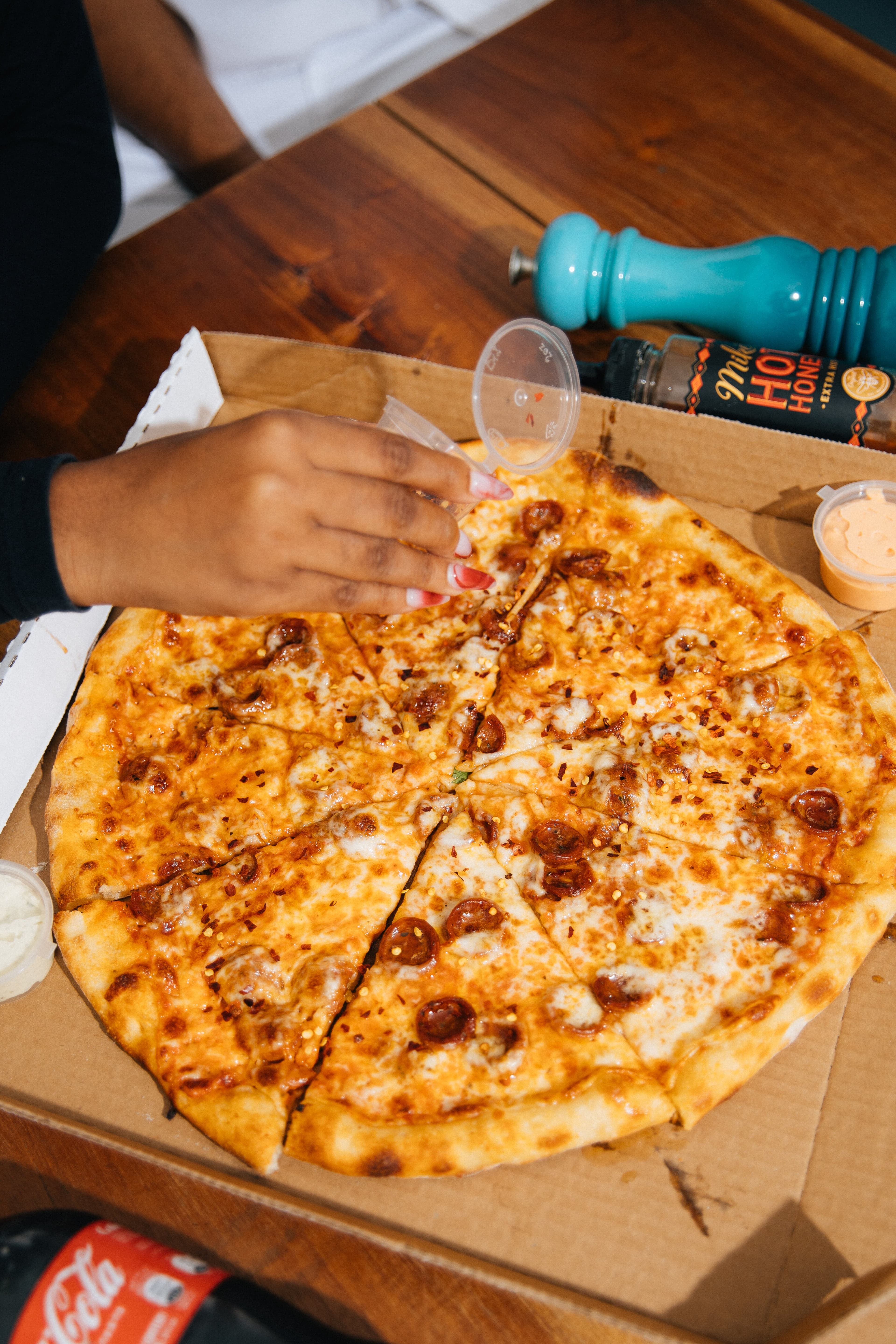 Try our famous Catalina, which is our signature crust and sauce and topped with house made Chorizo sausage and drizzled with Scotch Bonnet infused Jamaican honey.