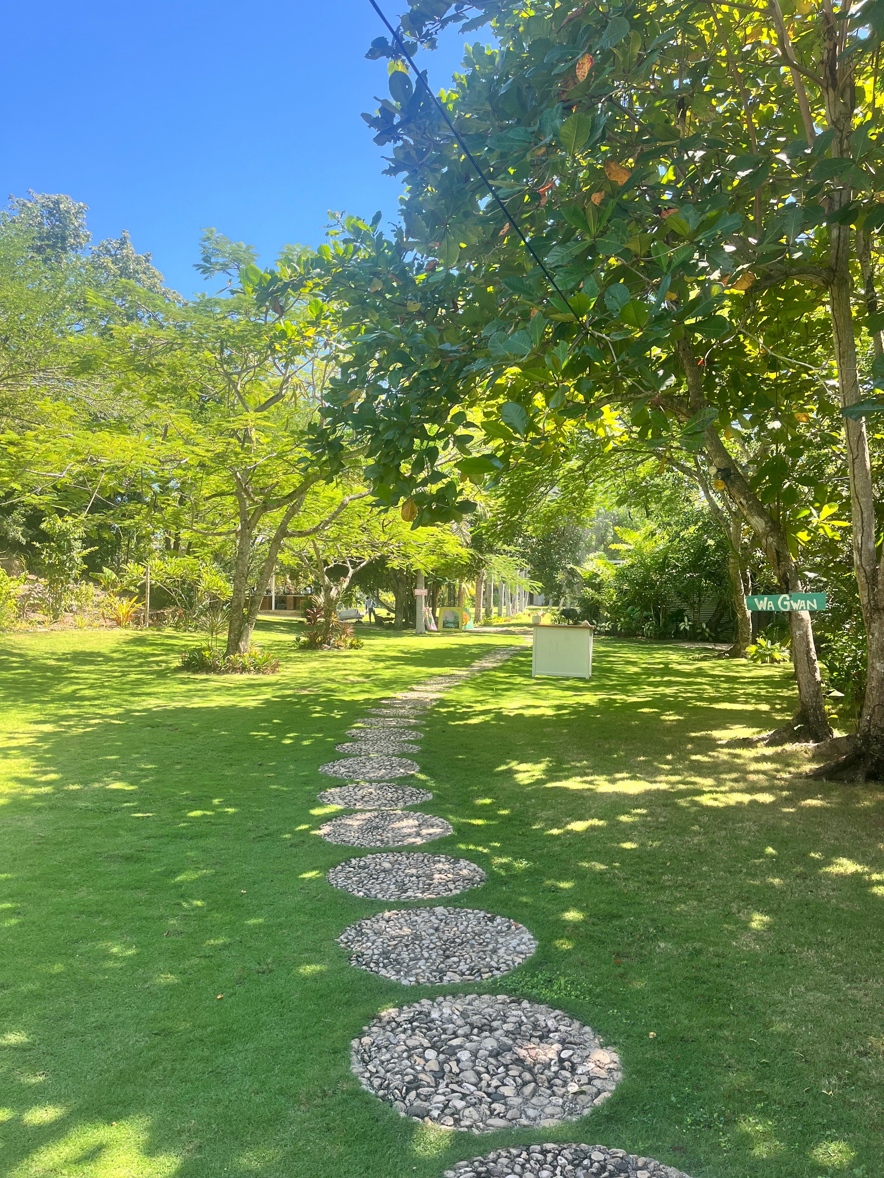 Walkway into the property after crossing the bridge from the parking lot